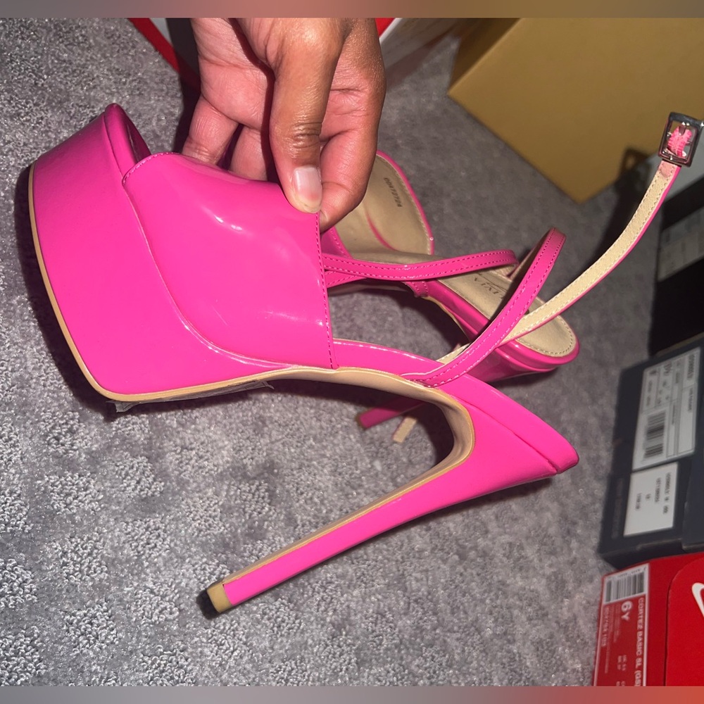 Barbie pink platform 6 inch heels.